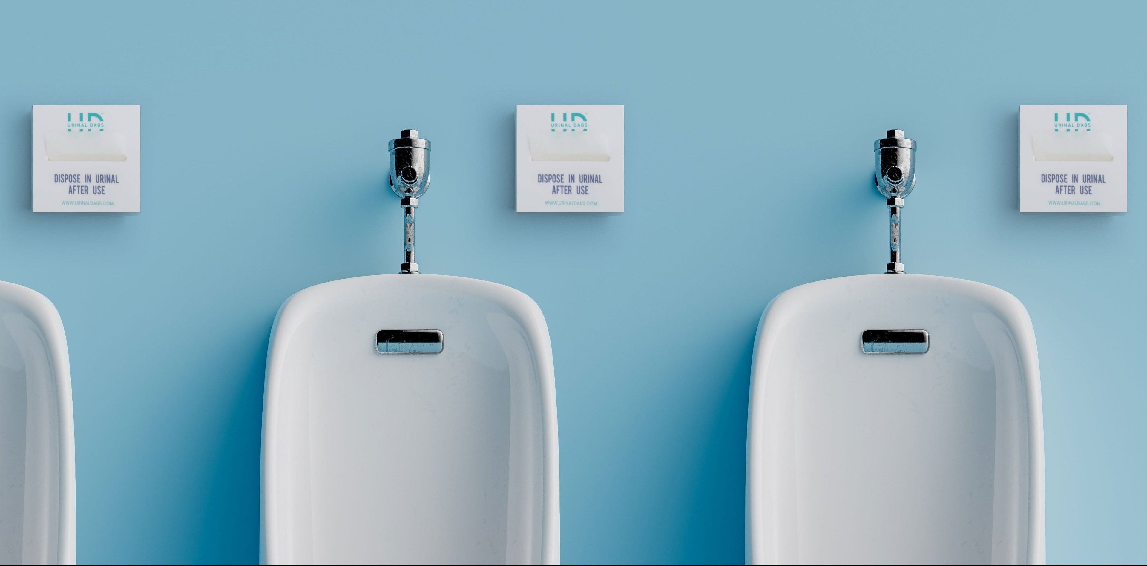 Wall-mounted Urinal Dabs dispenser for men’s restroom hygiene